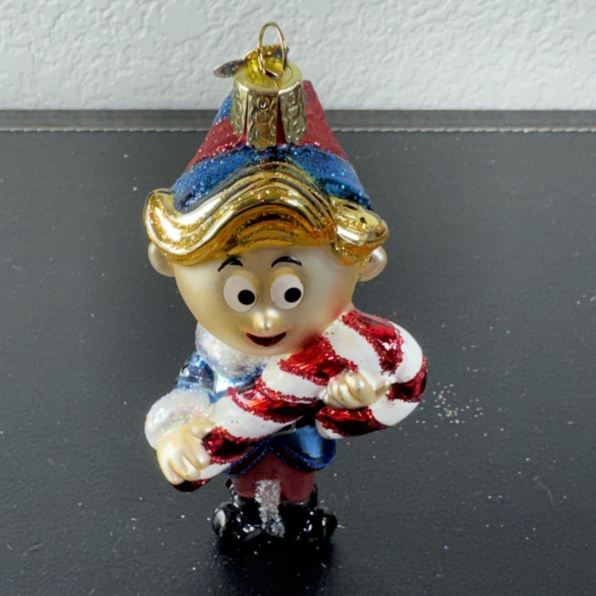 Old World Christmas Hermey the Misfit Elf hand blown glass ornament holding candy cane with original box
