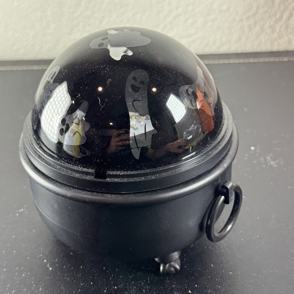 Hyde and EEK Boutique black cauldron LED rotating tabletop light casting ghost shadows