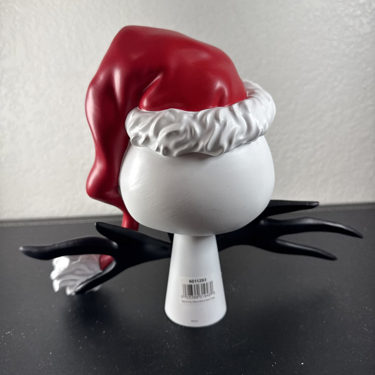 Department 56 Santa Jack Skellington tree topper in stone resin from Disney's The Nightmare Before Christmas