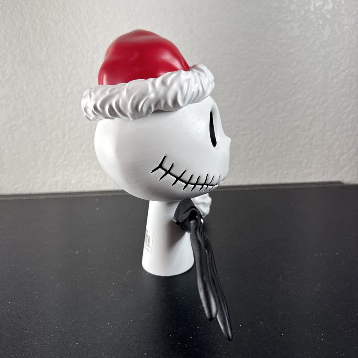 Department 56 Santa Jack Skellington tree topper in stone resin from Disney's The Nightmare Before Christmas