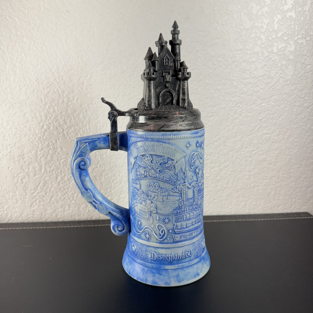 Disney Parks Disneyland 60th Anniversary ceramic lidded beer stein featuring Sleeping Beauty Castle top