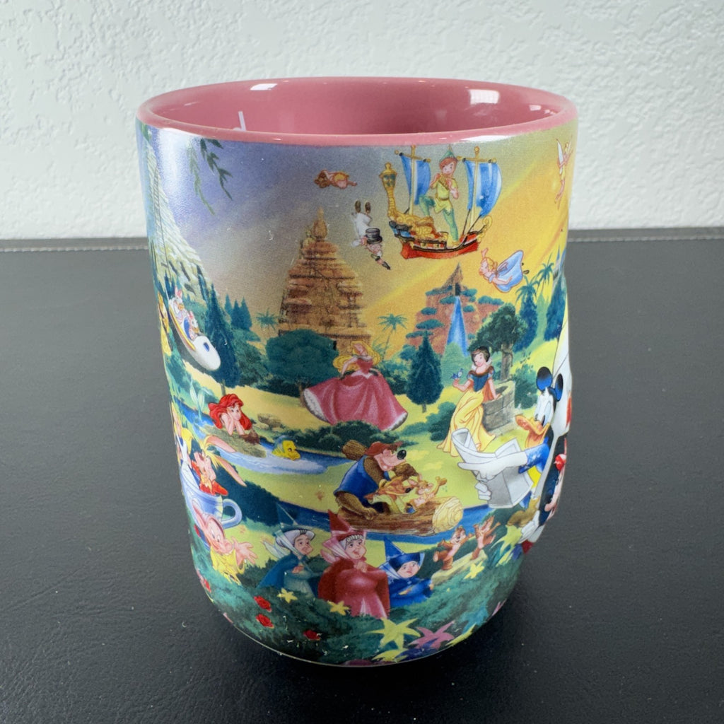 Disneyland park map ceramic coffee mug featuring Mickey Mouse and a pink interior glaze.