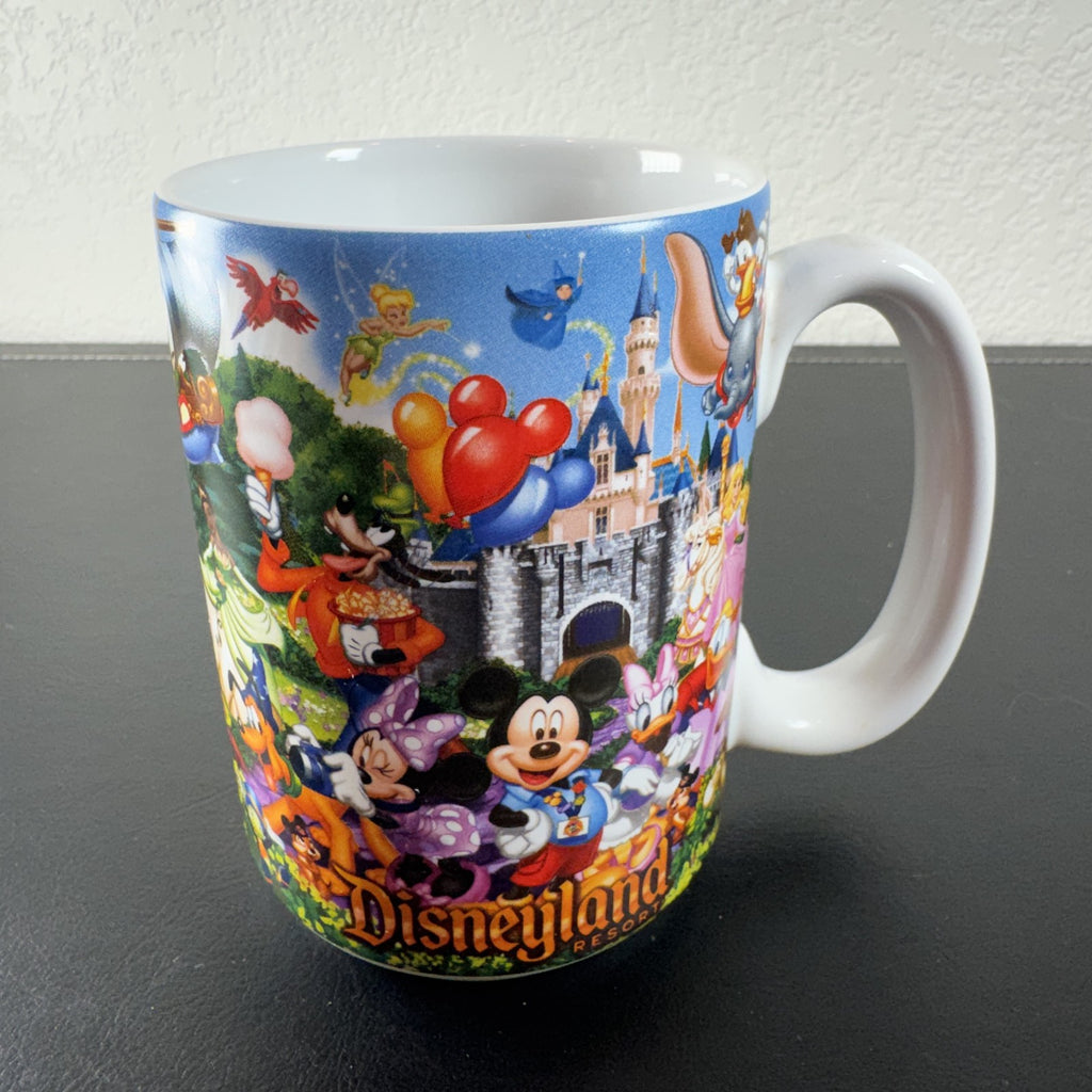 Disney Parks Grandma ceramic mug with Mickey Mouse, Sleeping Beauty Castle, and classic characters wraparound graphic.