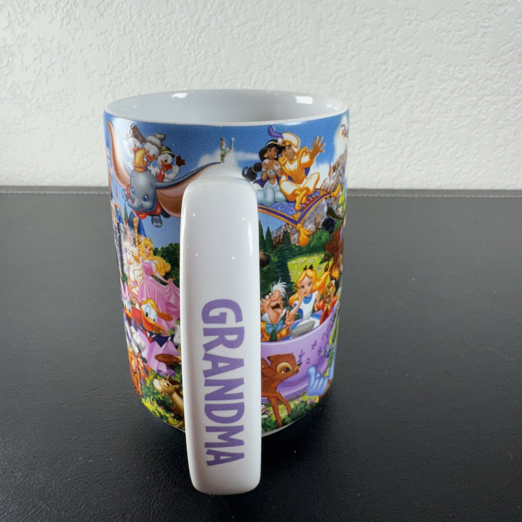 Disney Parks Grandma ceramic mug with Mickey Mouse, Sleeping Beauty Castle, and classic characters wraparound graphic.