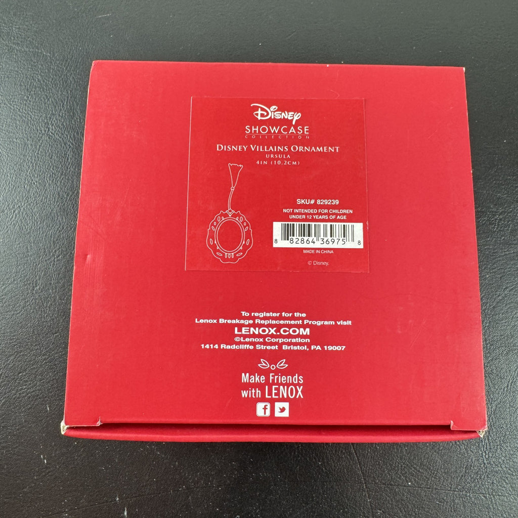 Lenox Disney Showcase Collection 4-inch Ursula hanging Christmas ornament shown in its original packaging box.