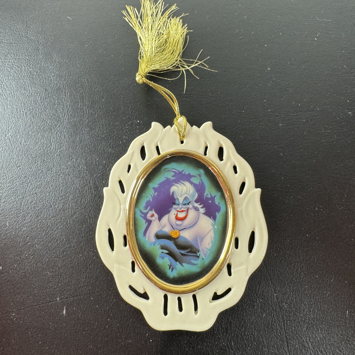 Lenox Disney Showcase Collection 4-inch Ursula hanging Christmas ornament shown in its original packaging box.
