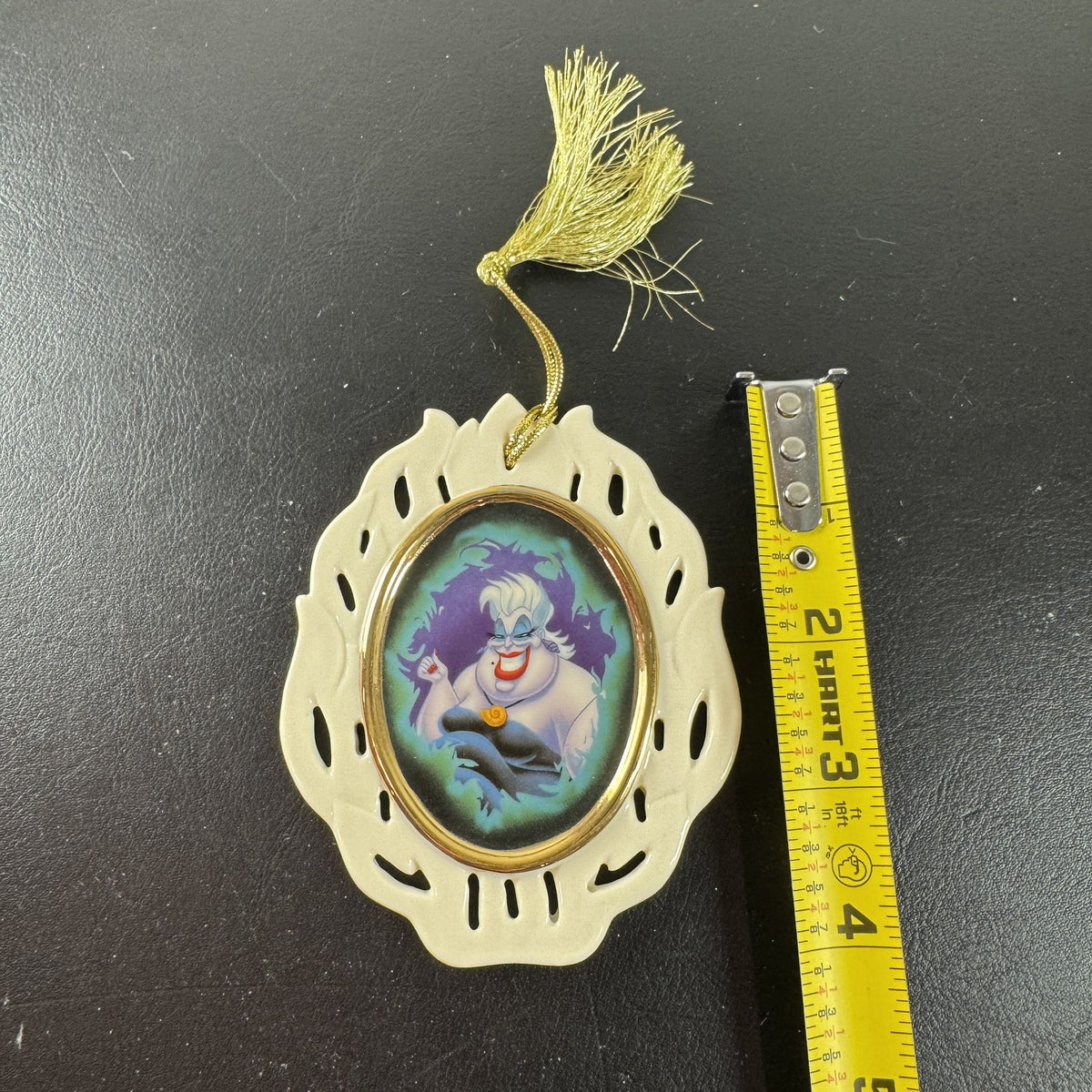 Lenox Disney Showcase Collection 4-inch Ursula hanging Christmas ornament shown in its original packaging box.