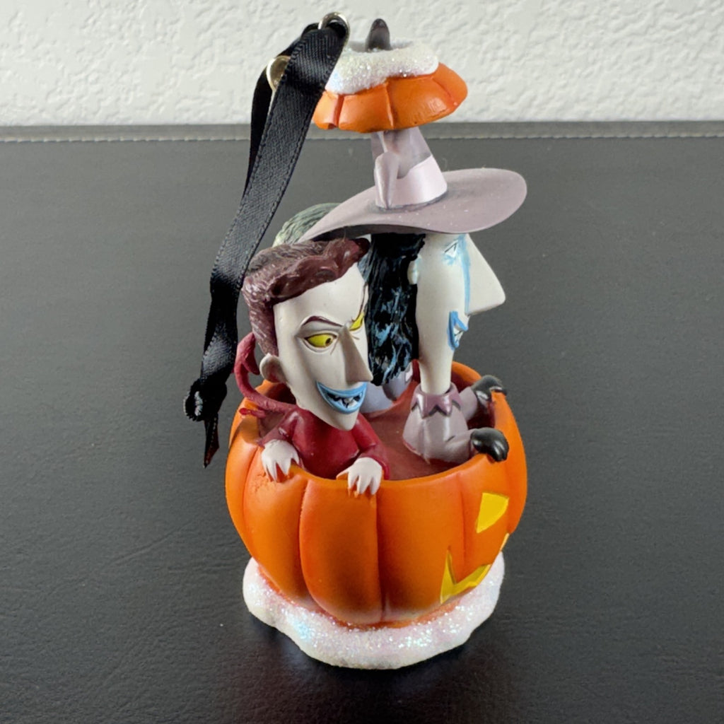 Disney Nightmare Before Christmas Lock, Shock, and Barrel resin pumpkin ornament with glitter base.