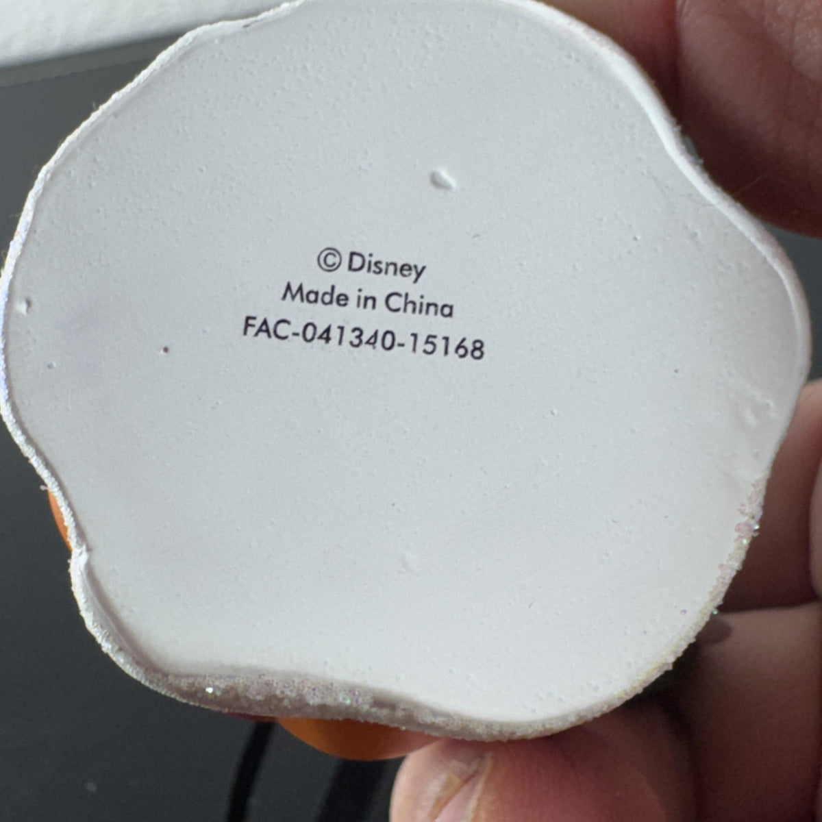 Disney Nightmare Before Christmas Lock, Shock, and Barrel resin pumpkin ornament with glitter base.