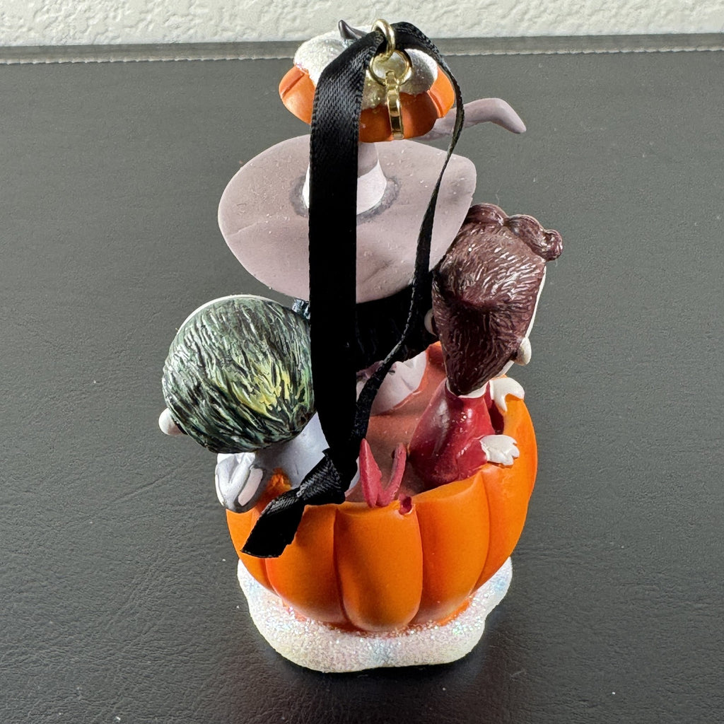 Disney Nightmare Before Christmas Lock, Shock, and Barrel resin pumpkin ornament with glitter base.