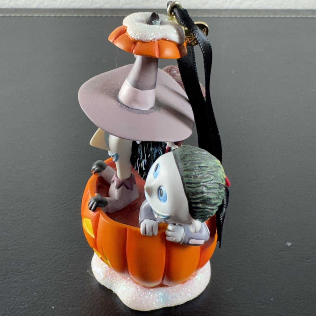Disney Nightmare Before Christmas Lock, Shock, and Barrel resin pumpkin ornament with glitter base.
