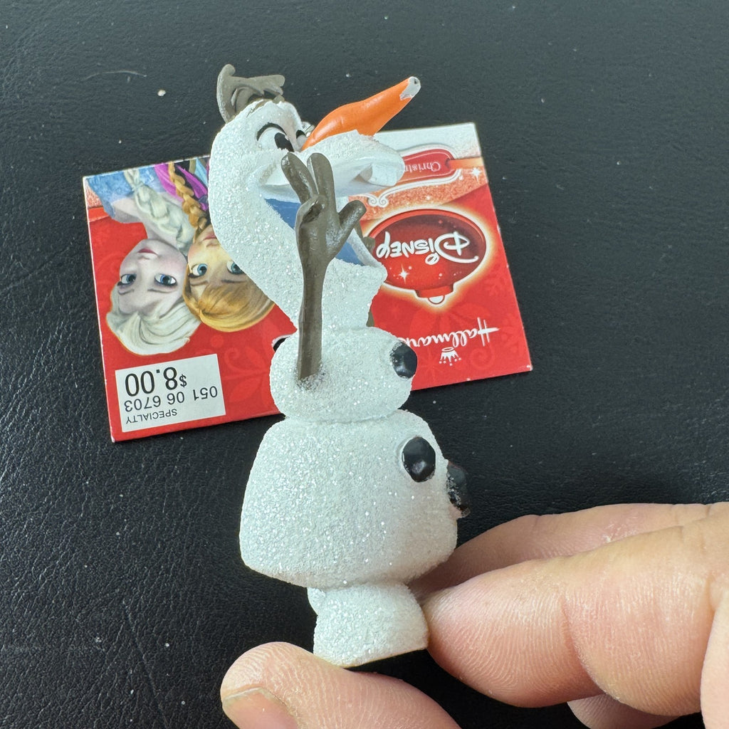 Hallmark 2015 Disney Frozen Olaf glitter resin Christmas tree ornament with original hang tag attached.