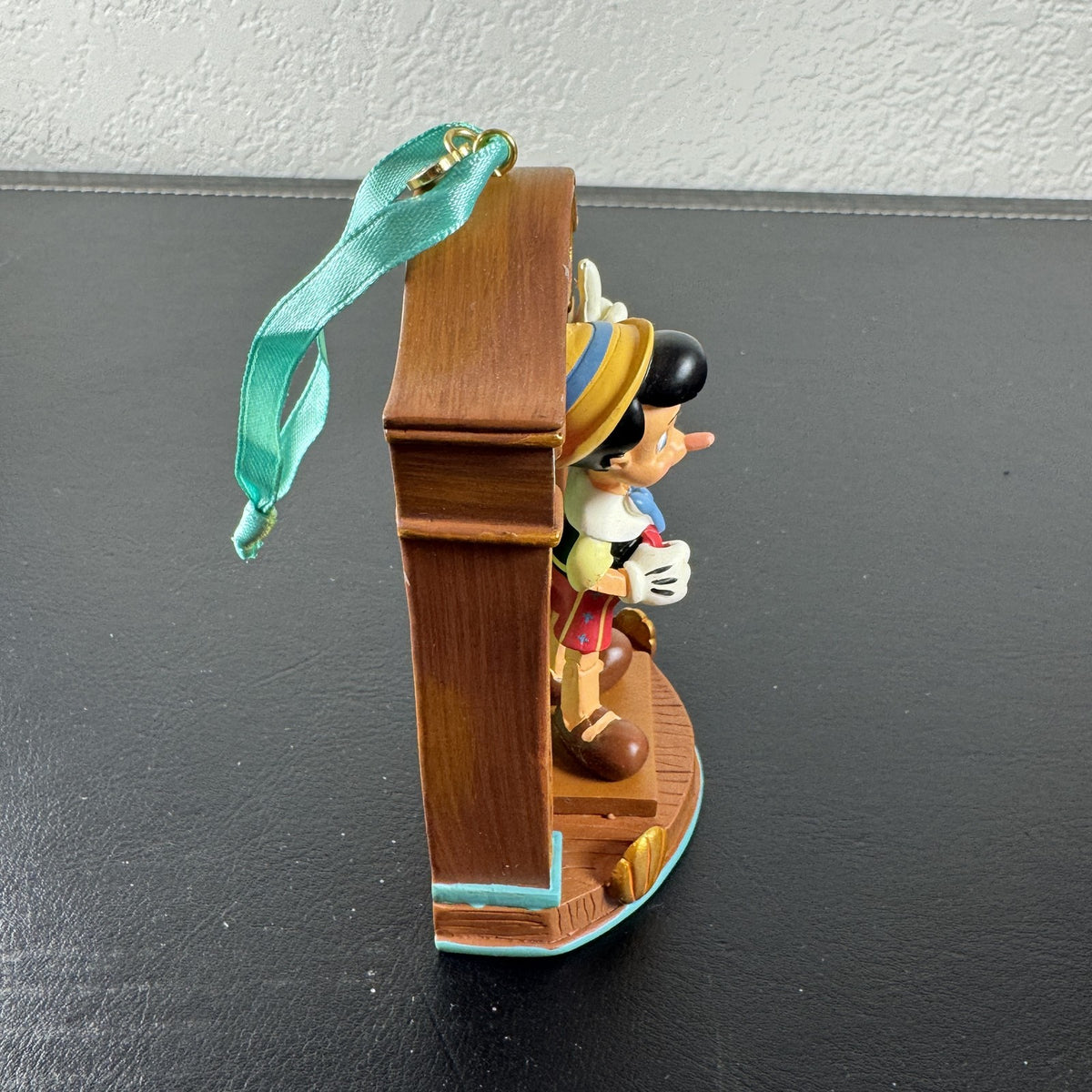 Disney Store Sketchbook Pinocchio puppet stage resin Christmas ornament with satin ribbon.