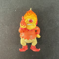 2015 Hallmark Keepsake Heat Miser resin Christmas ornament featuring glitter accents and gold hanging loop.