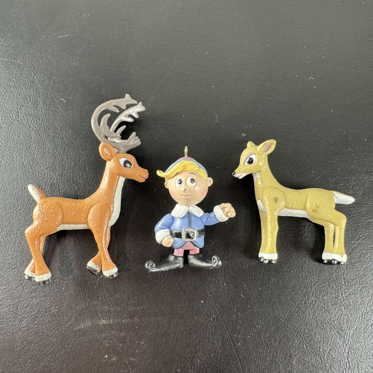 Vintage set of 3 molded plastic Christmas ornaments featuring Rudolph the Red-Nosed Reindeer, Hermey, and Clarice.