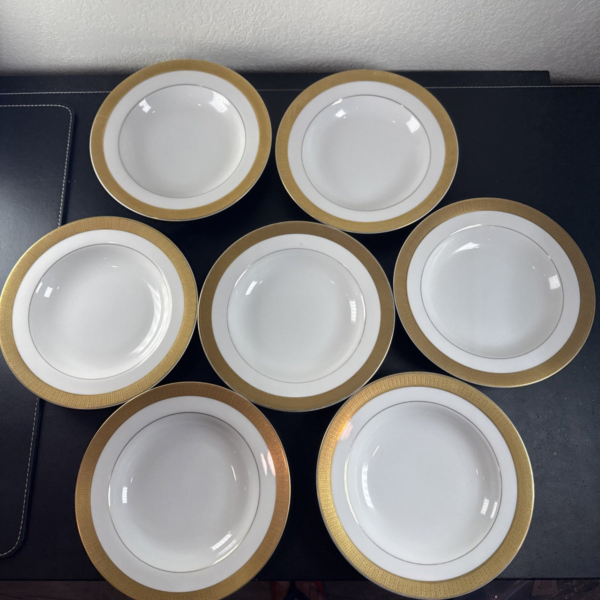 Set of 7 Sango Georgetown fine china 8.5-inch rim soup bowls featuring gold trim, made in Japan.