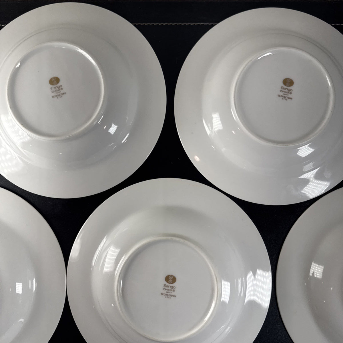 Set of 7 Sango Georgetown fine china 8.5-inch rim soup bowls featuring gold trim, made in Japan.