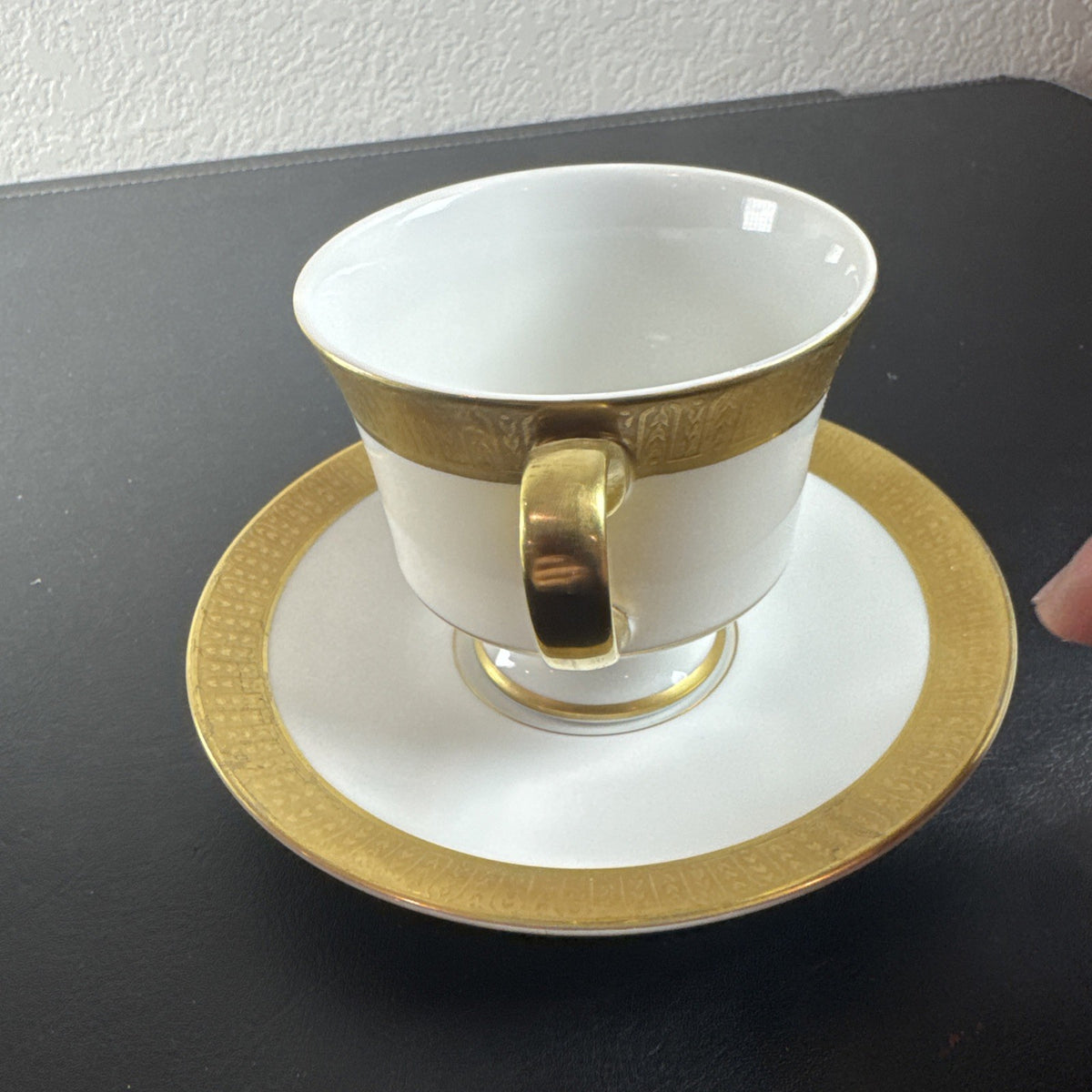 Sango Georgetown fine china teacup and saucer set of 2 featuring white porcelain with gold encrusted border trim.