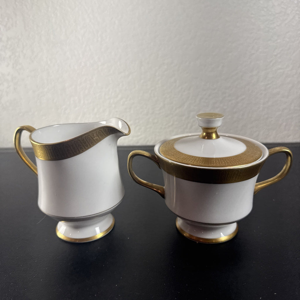Sango Georgetown pattern 3755 fine china creamer pitcher and covered sugar bowl set with gold handles and trim.