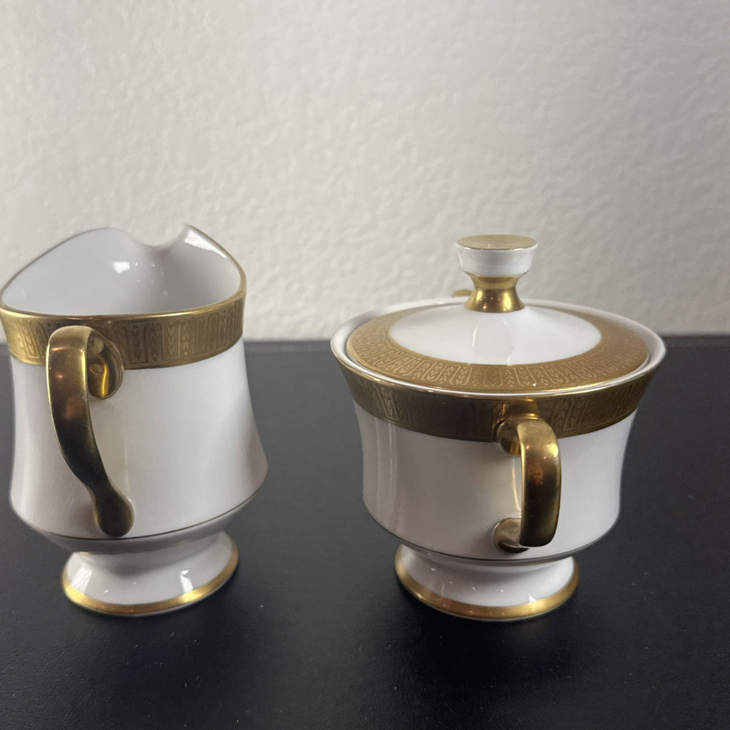 Sango Georgetown pattern 3755 fine china creamer pitcher and covered sugar bowl set with gold handles and trim.