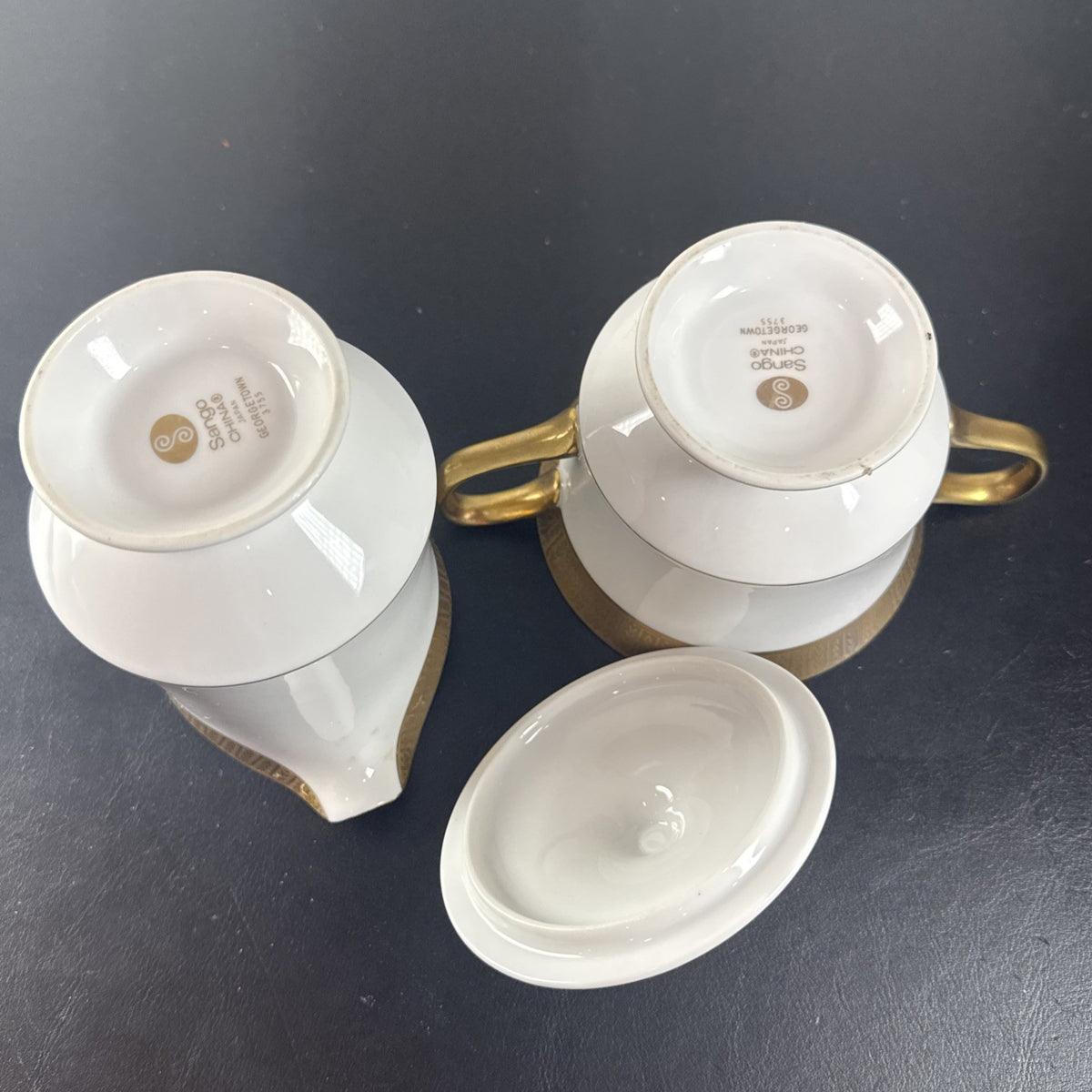 Sango Georgetown pattern 3755 fine china creamer pitcher and covered sugar bowl set with gold handles and trim.