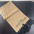 Tan knit Twilight Saga New Moon promo scarf featuring the Cullen family crest and black fringe tassels.