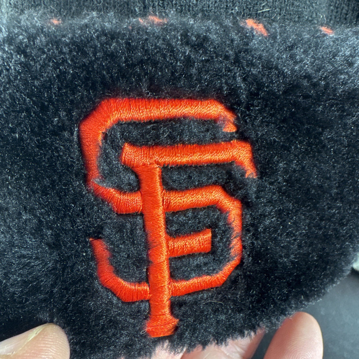 San Francisco Giants promotional trapper hat by Danbury Mint featuring the official MLB team logo.