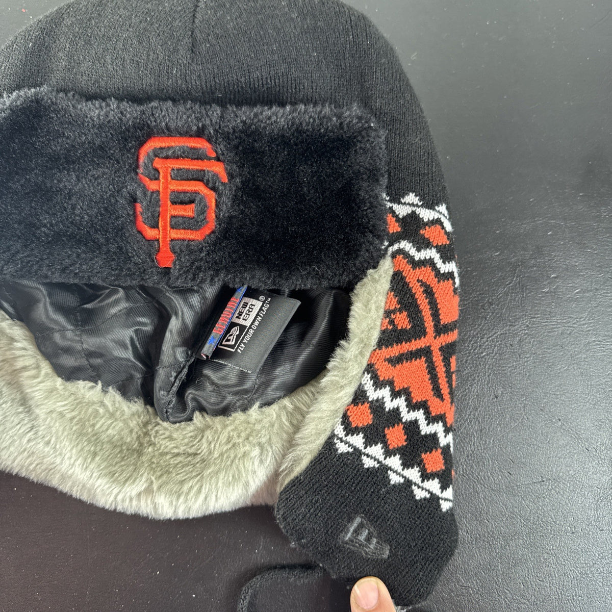 San Francisco Giants promotional trapper hat by Danbury Mint featuring the official MLB team logo.