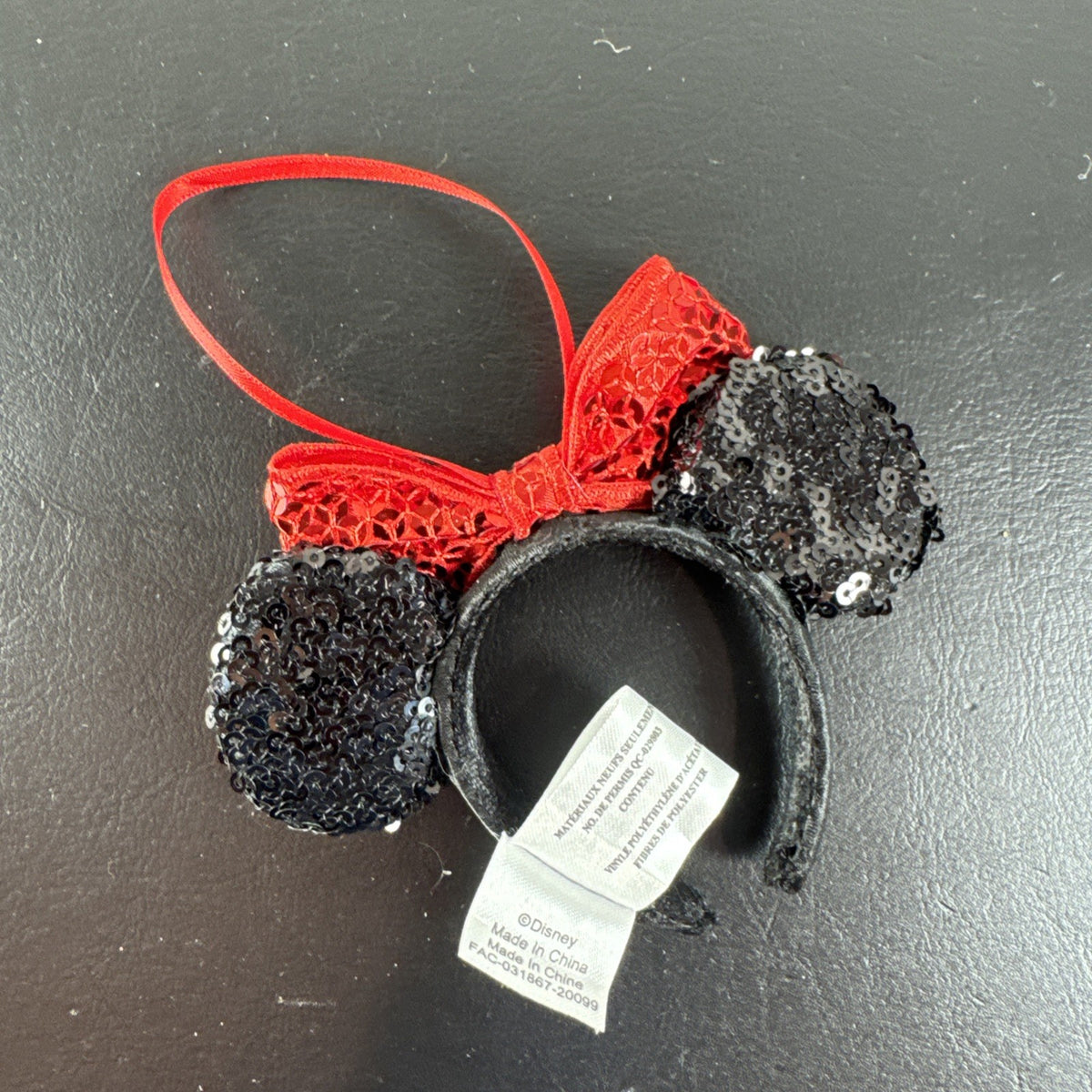 Disney Parks Minnie Mouse Christmas headband ornament featuring sequined ears and bow