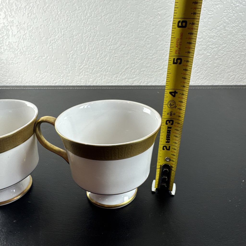 Pair of vintage Japanese Sango Georgetown fine china teacups with heavy gold rim detailing.