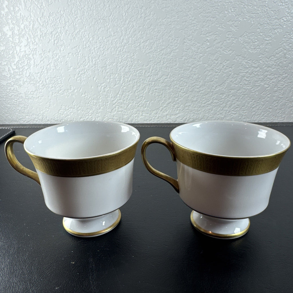 Pair of vintage Japanese Sango Georgetown fine china teacups with heavy gold rim detailing.