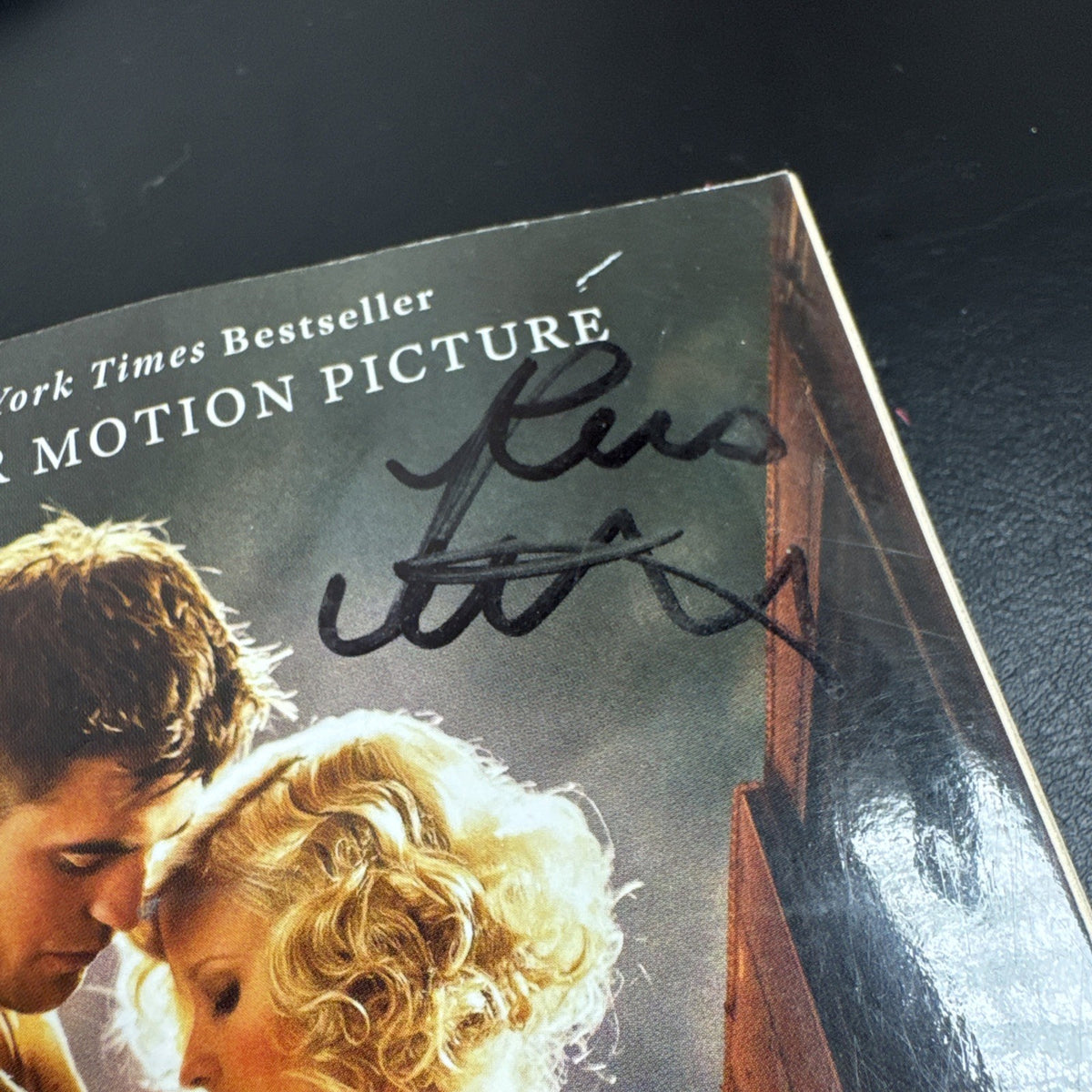Front cover of Water for Elephants movie tie-in paperback by Sara Gruen with unverified Robert Pattinson signature.