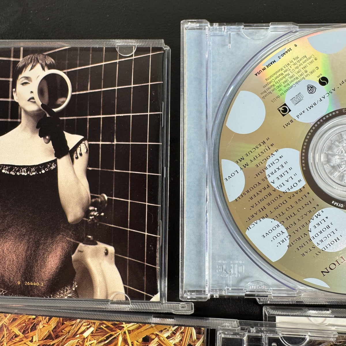 Lot of 4 Madonna CDs including The Immaculate Collection, American Life, and two Music album cover variants.