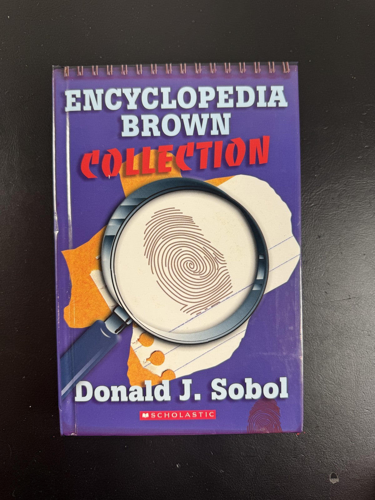 Encyclopedia Brown Collection spiral bound book by Donald J. Sobol, published by Scholastic.