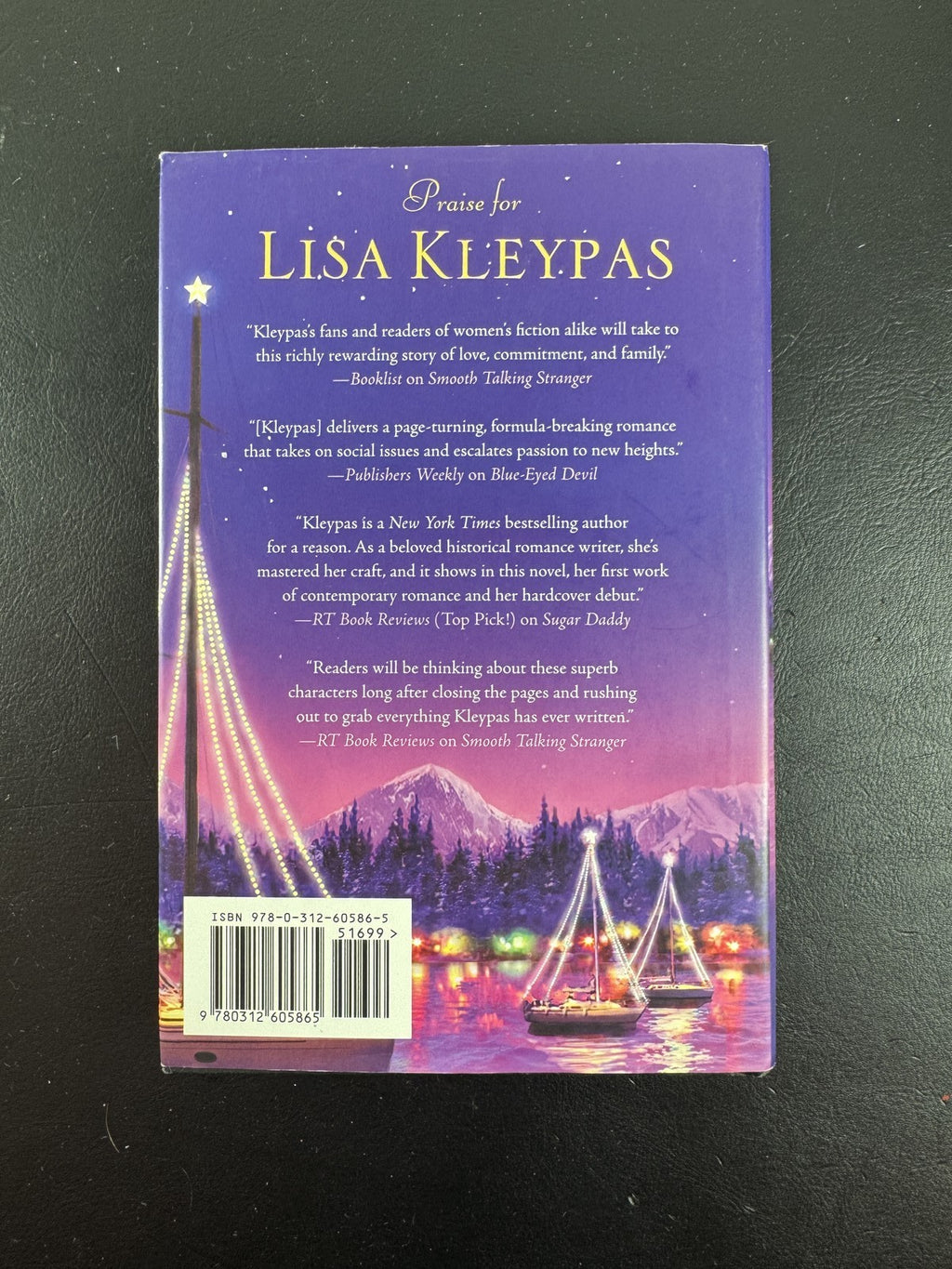 Hardcover book cover for Christmas Eve at Friday Harbor by Lisa Kleypas, 2010 St. Martin's Press edition.