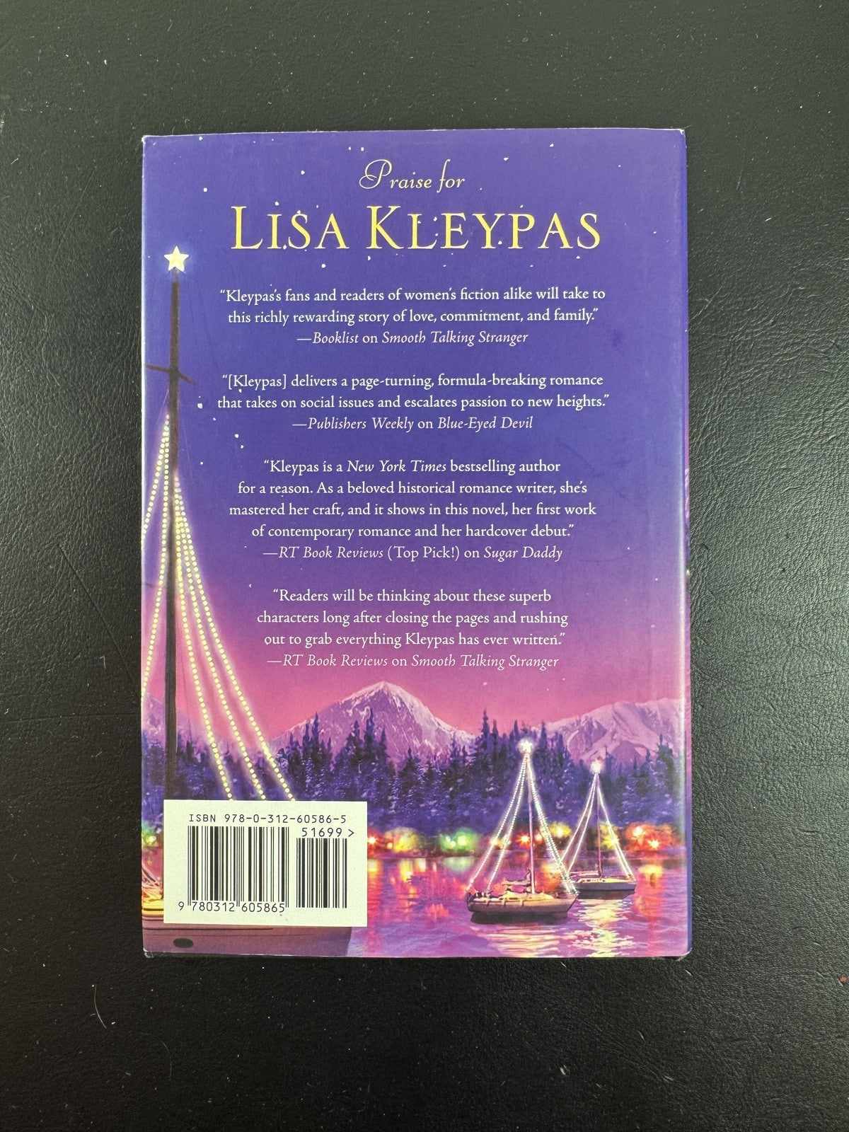 Hardcover book cover for Christmas Eve at Friday Harbor by Lisa Kleypas, 2010 St. Martin's Press edition.