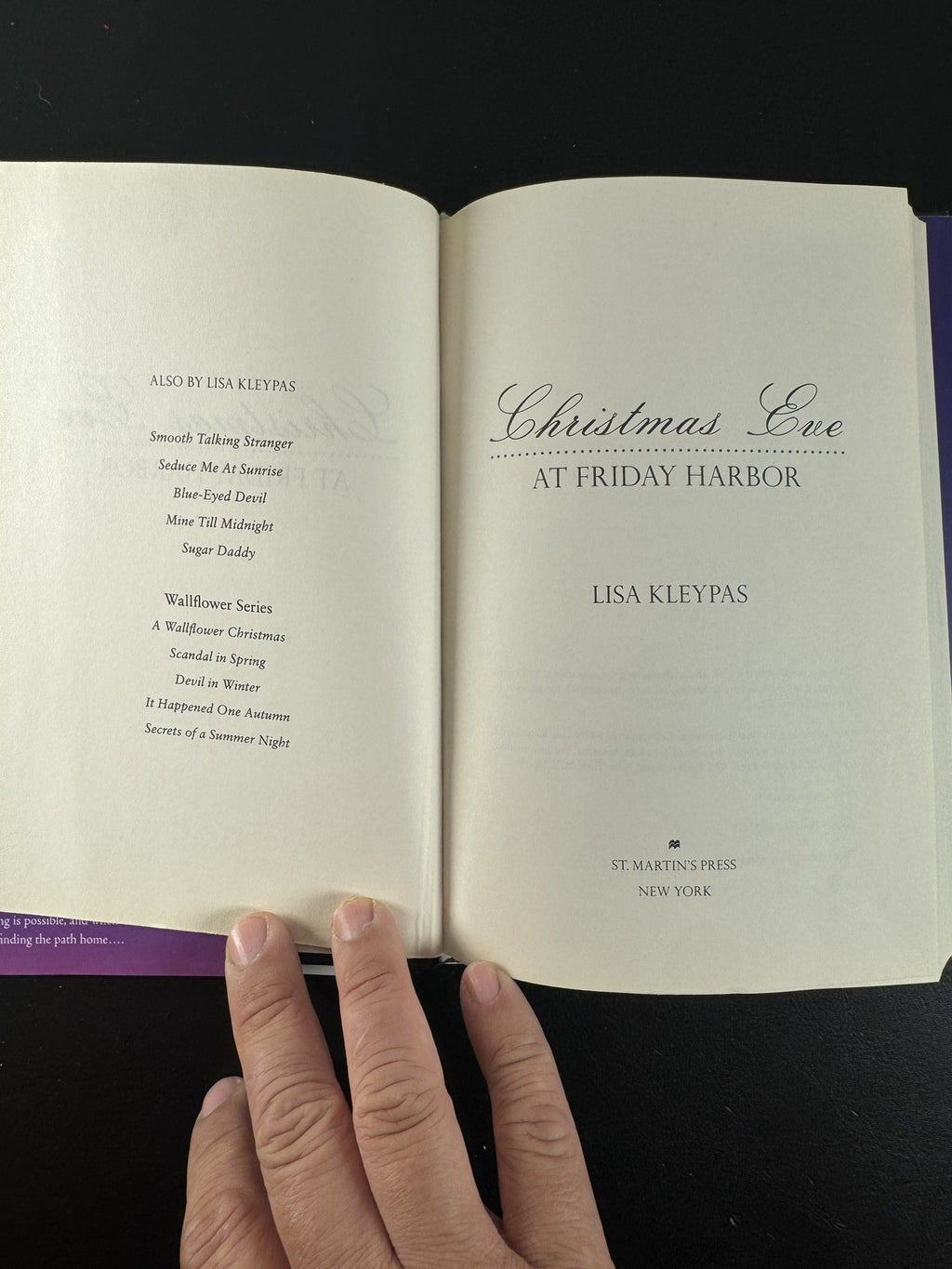 Hardcover book cover for Christmas Eve at Friday Harbor by Lisa Kleypas, 2010 St. Martin's Press edition.