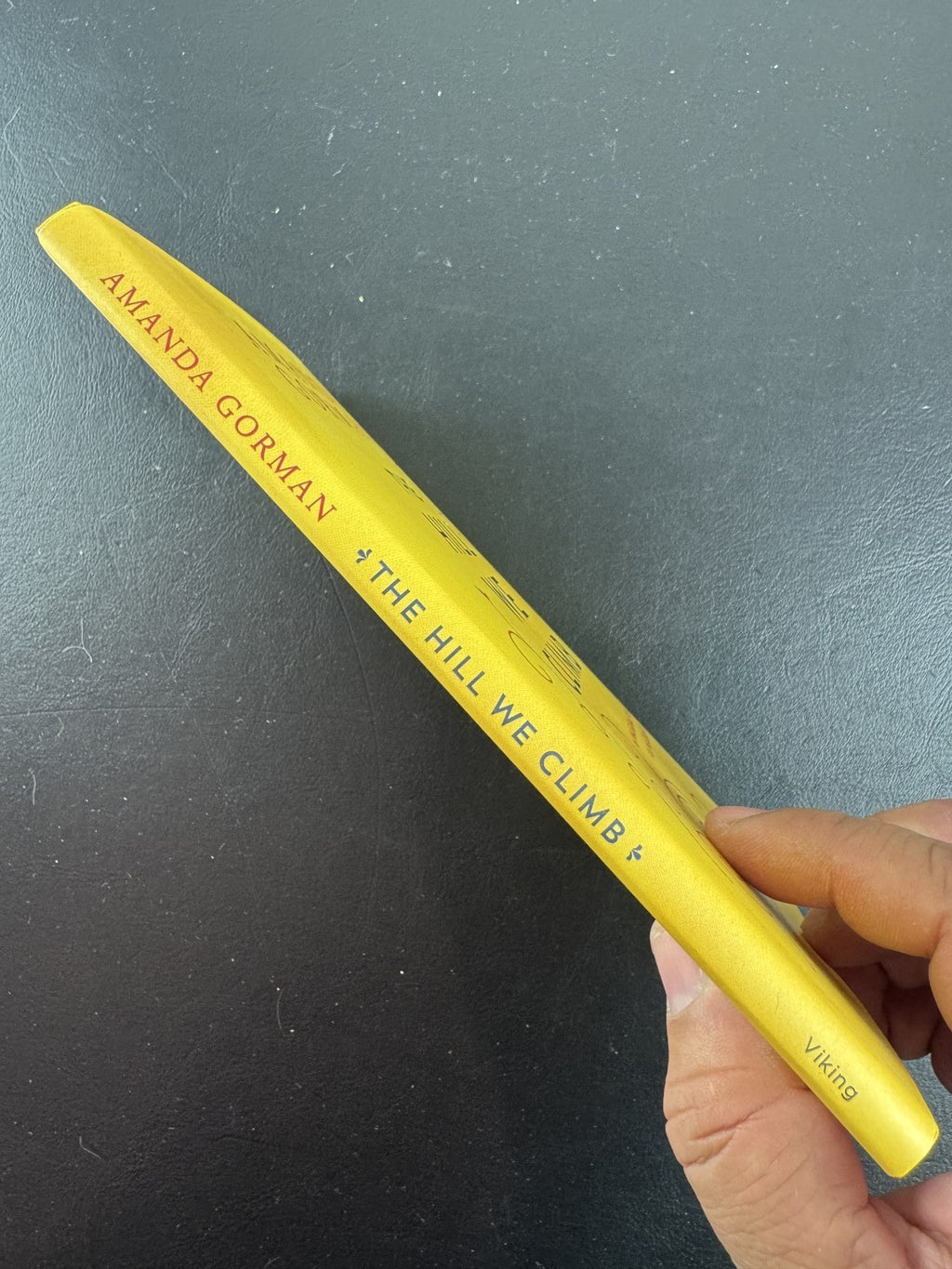 Front cover of Amanda Gorman's hardcover poetry book, The Hill We Climb, 2021 Viking first edition.