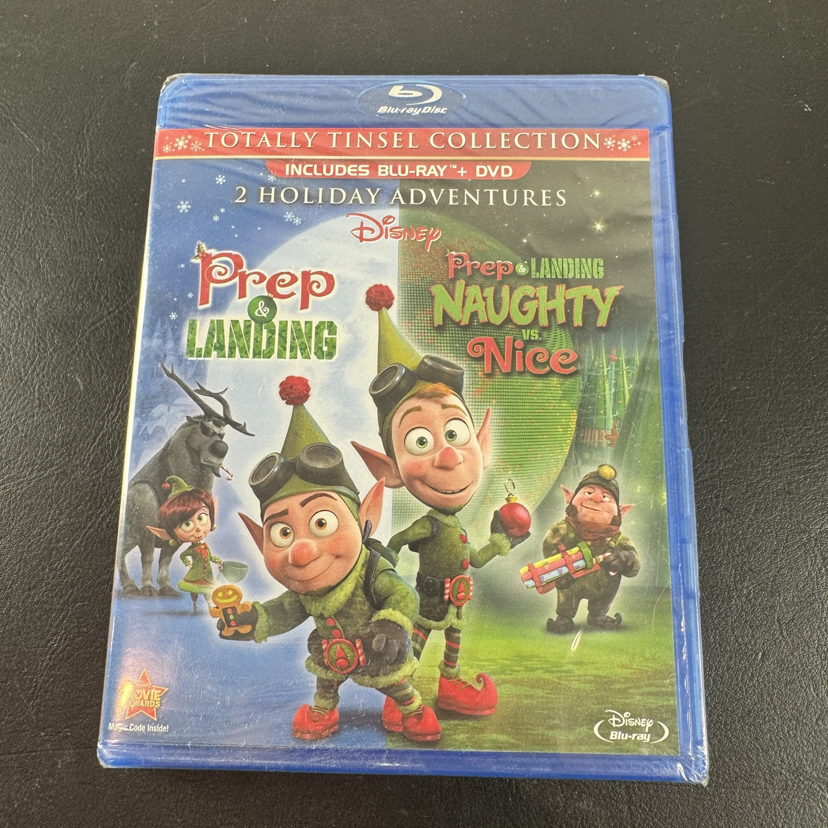 Front cover of Disney Prep and Landing Totally Tinsel Collection factory sealed Blu-ray and DVD combo set.