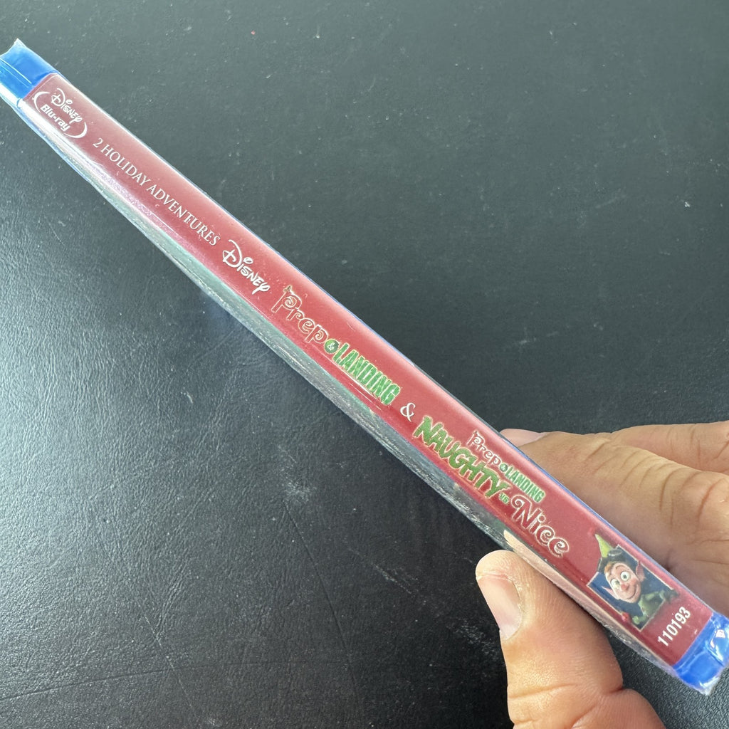 Front cover of Disney Prep and Landing Totally Tinsel Collection factory sealed Blu-ray and DVD combo set.
