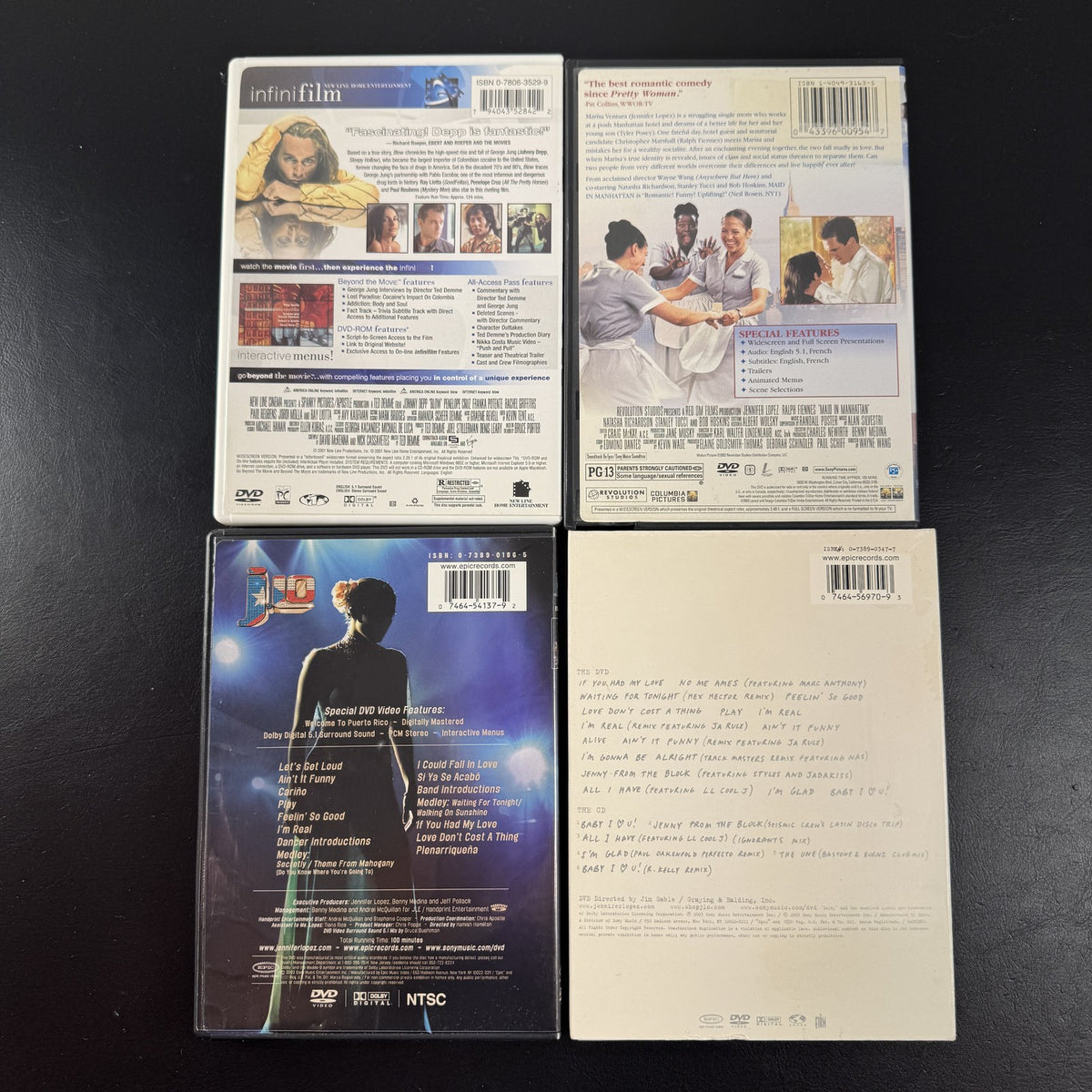 Set of 4 pre-owned DVDs including Blow starring Johnny Depp and Jennifer Lopez movies and music specials.