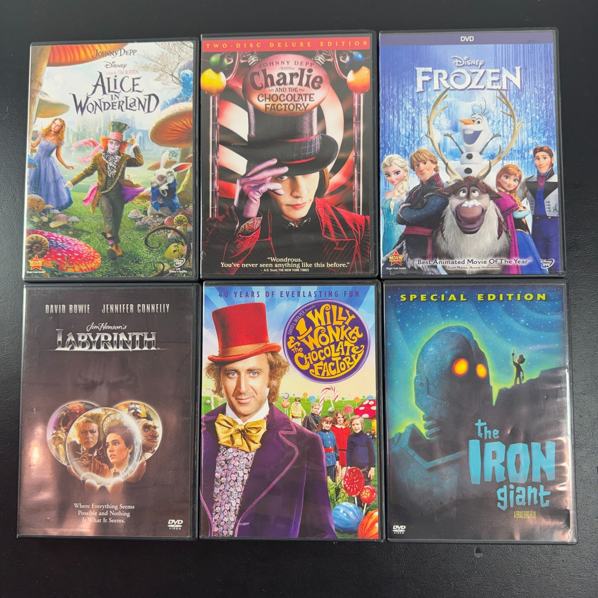 Set of 6 pre-owned family fantasy DVDs including Labyrinth, Frozen, The Iron Giant, and Alice in Wonderland