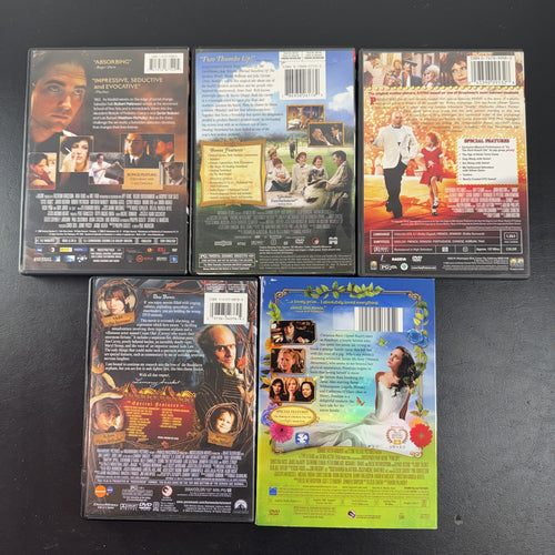 Collection of 5 pre-owned DVD movie cases including Finding Neverland, Annie, and A Series of Unfortunate Events.