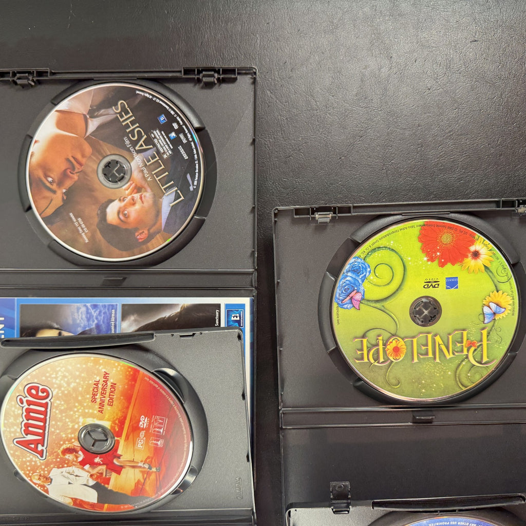 Collection of 5 pre-owned DVD movie cases including Finding Neverland, Annie, and A Series of Unfortunate Events.