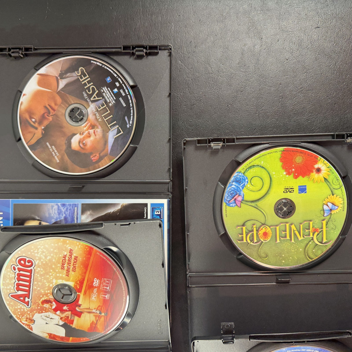 Collection of 5 pre-owned DVD movie cases including Finding Neverland, Annie, and A Series of Unfortunate Events.