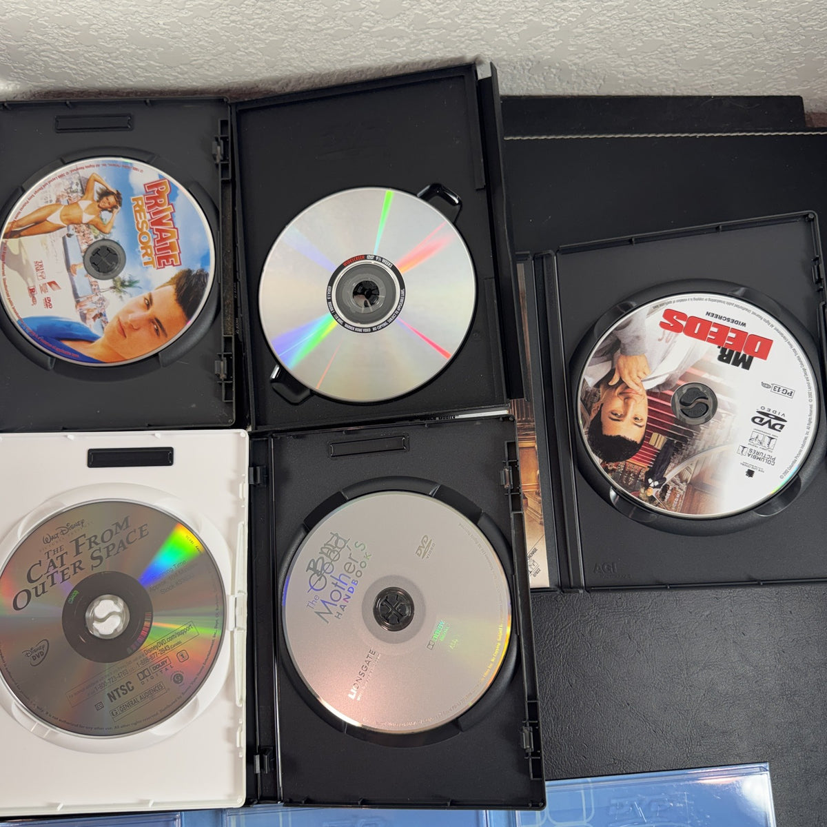 Collection of 6 pre-owned DVDs including Mr Deeds, Who's the Boss, 9 1/2 Weeks, and Private Resort