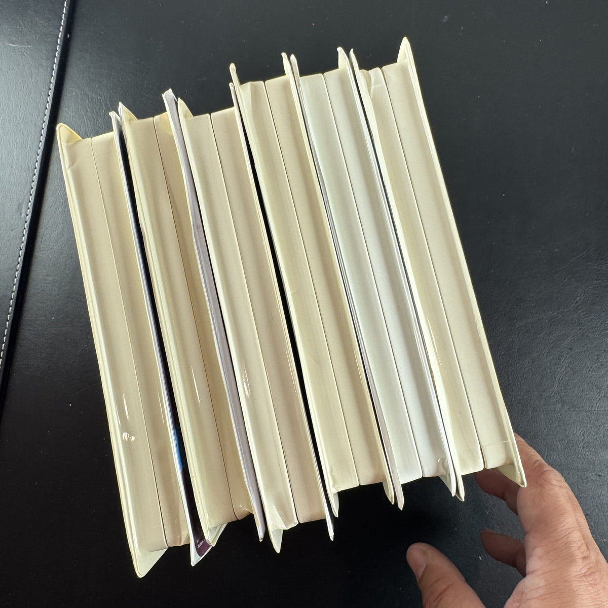 Set of 6 vintage Disney VHS tapes including Toy Story, Lion King, and Pinocchio in slipcases.