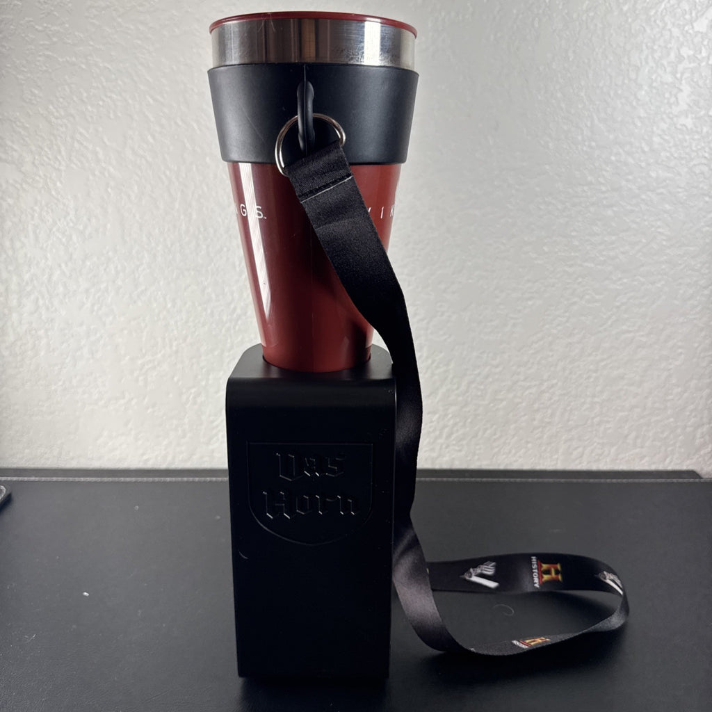 Red Das Horn Vikings History Channel promotional drinking horn with black display stand and lanyard.