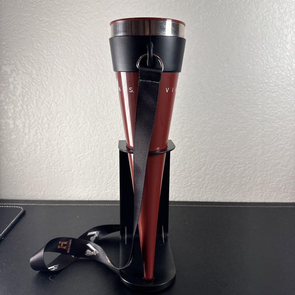 Red Das Horn Vikings History Channel promotional drinking horn with black display stand and lanyard.