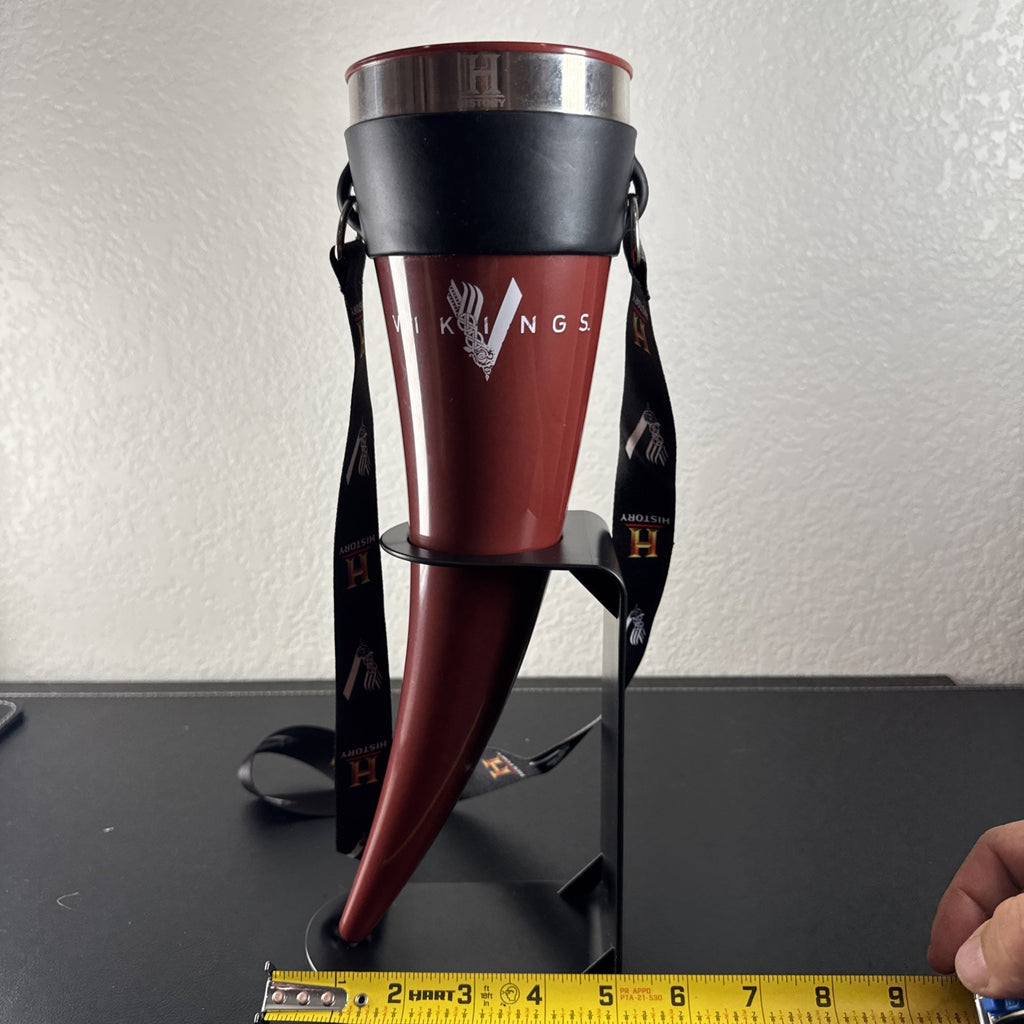 Red Das Horn Vikings History Channel promotional drinking horn with black display stand and lanyard.